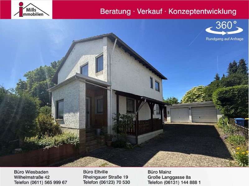 Freistehendes Einfamilienhaus mit schönem Garten in begehrter Feldrandlage von Oestrich-Winkel